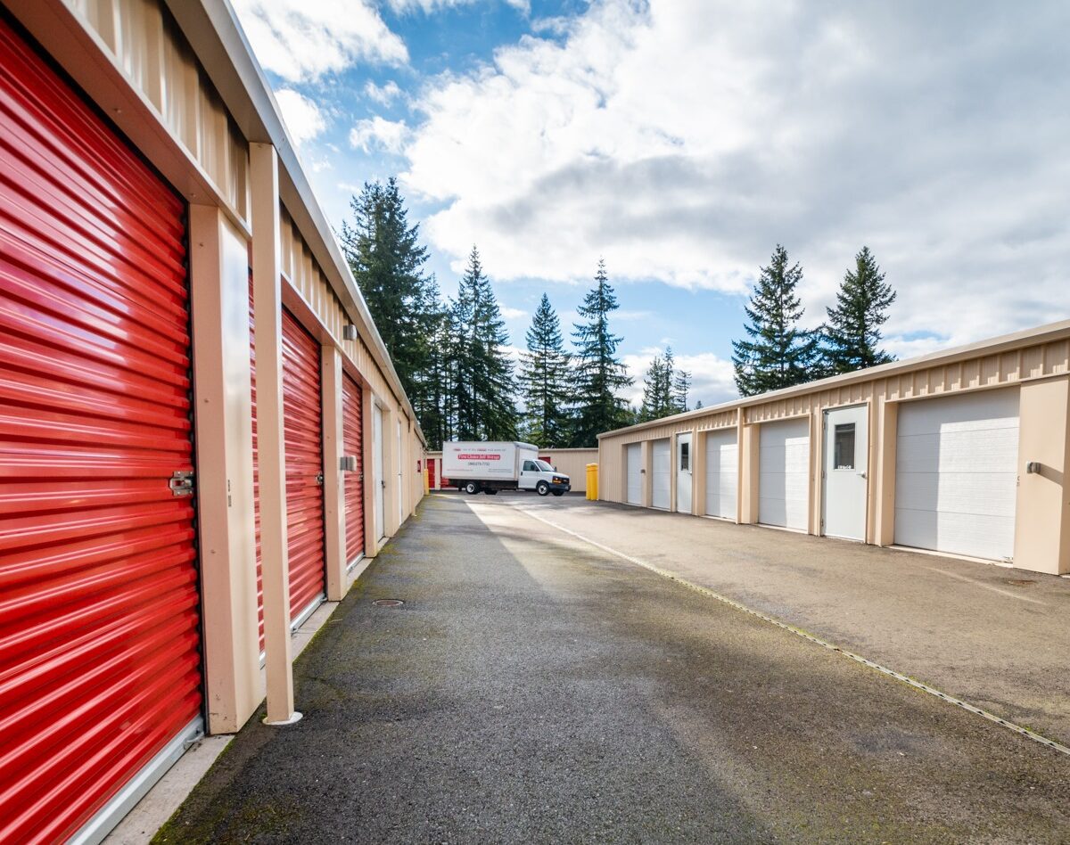 Outside of first choice self storage facility with car park - Secure Storage Solutions
